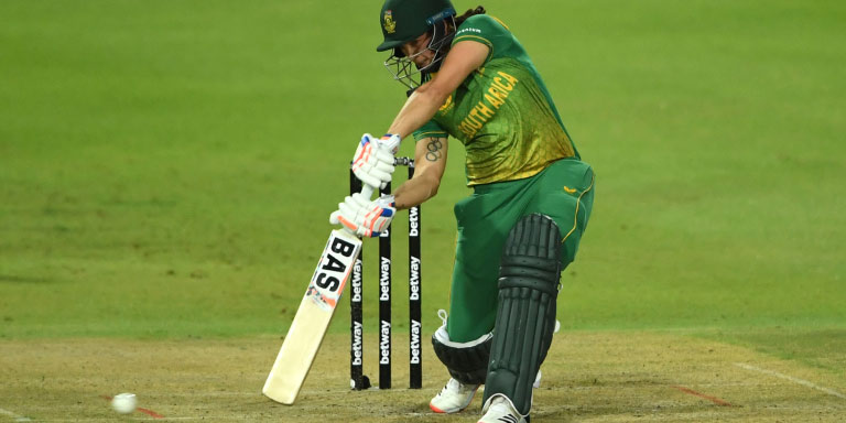 A woman cricketer from the Momentum Protea’s Women’s cricket team in an action shot.