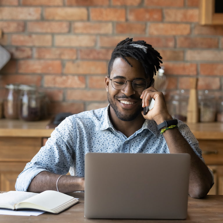 Young African man completing his online will questionnaire.