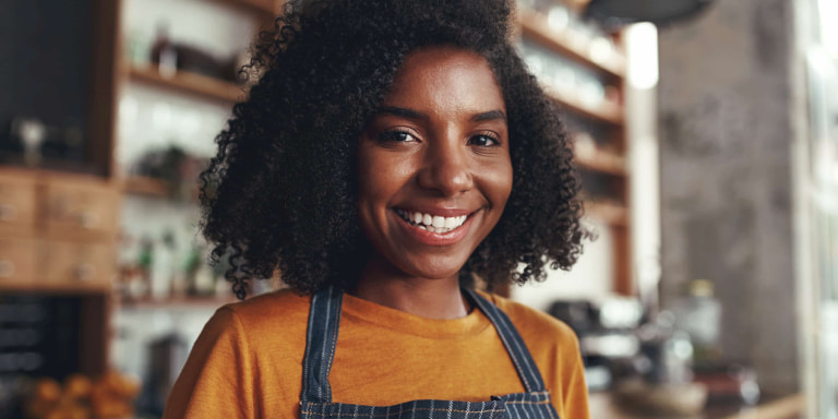 health4me young barista lady smiling