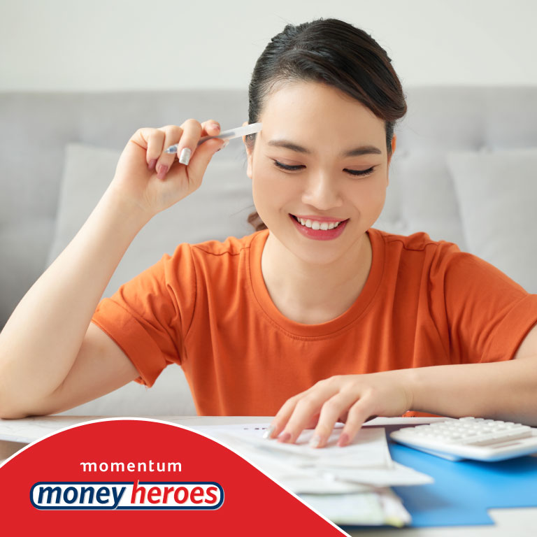  A young female shopping around for the best interest rate to help her avoid getting into bad debt. Speak to a financial adviser to help you manage your debt.