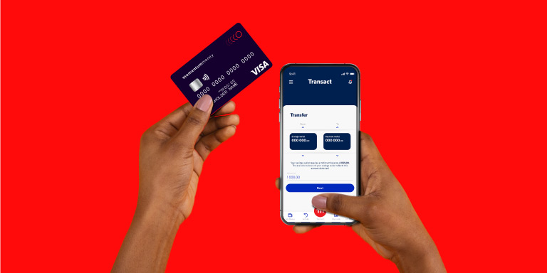 A man is holding the Momentum Money Visa card in one hand and transacting on the Momentum Money App in the other hand.
