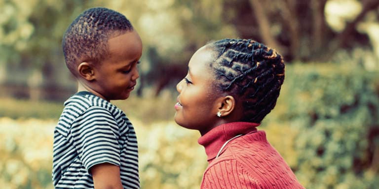 lady speaking to child